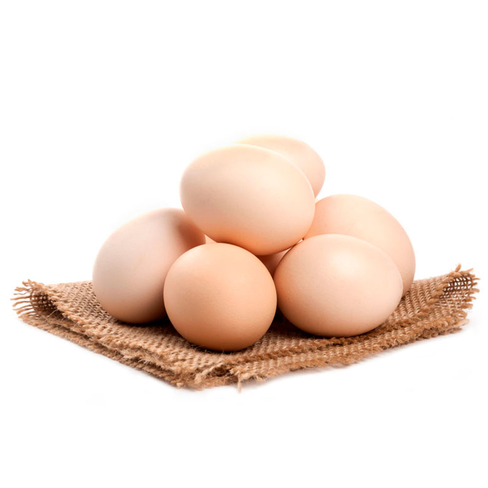 Huevos camperos encima de un trapo marrón